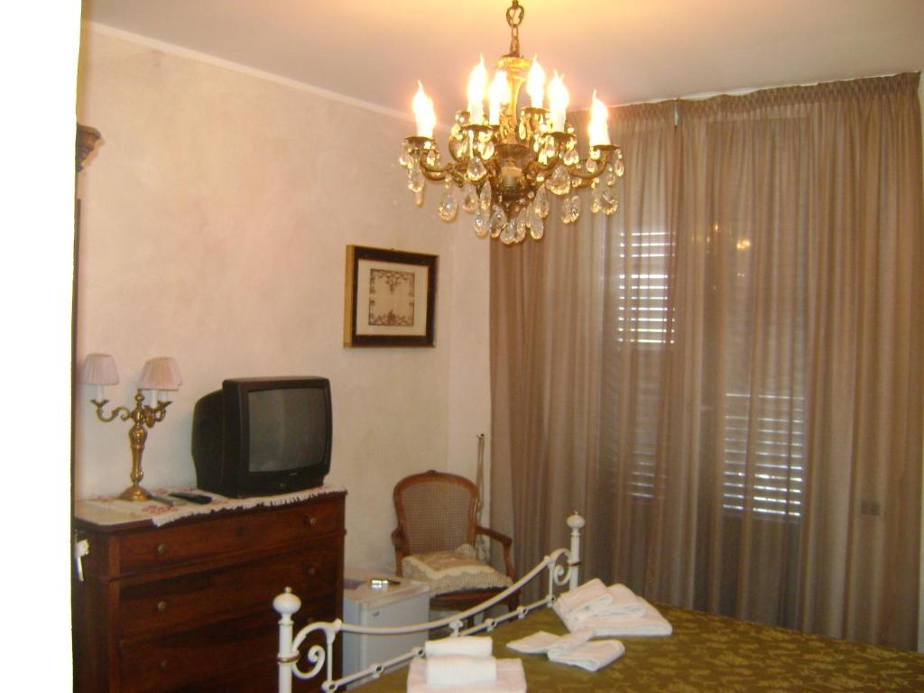 Hotel La Petite Maison Виареджо Номер фото